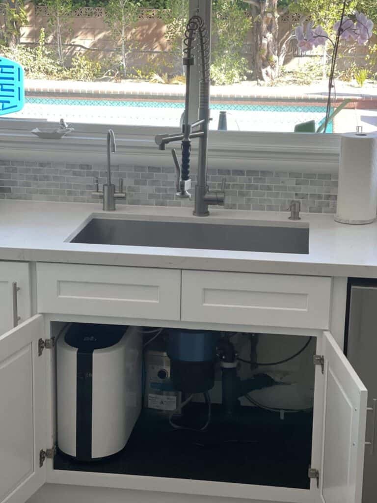 under sink reverse osmosis installation far view in a los angeles kitchen